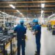 Industrial electrical contractors performing maintenance on electrical equipment